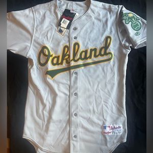 Authentic brand new Rawlings Oakland A’s gray baseball jersey.  Size 40